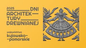 Drewniana bariera dekorowana tańczącymi postaciami góralek w tradycyjnym stroju ludowym.