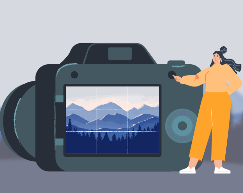 Postać kobieca i aparat fotograficzny nakierowany na krajobraz.