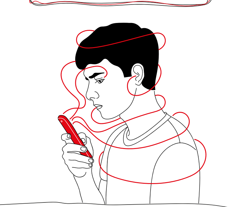 Chłopaka trzymającego smartfon oplatają nitki wyłaniające się z ekranu.