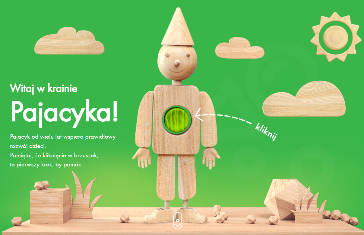 Zrzut ekranu strony www.pajacyk.pl z uśmiechniętym drewnianym pajacykiem.